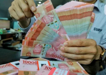 Rupiah Melemah ke 18140 per Dolar AS, Simak Prediksi Mata Uang Garuda Hari Ini